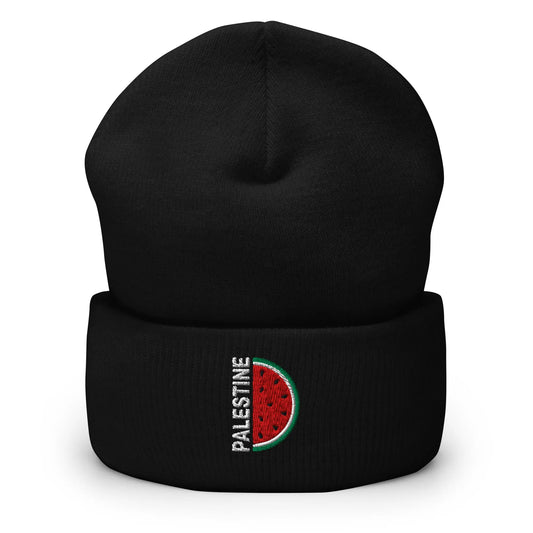 knit Palestine beanie featuring embroidered watermelon slice and "Palestine" text.
Close-up of the embroidered Palestinian watermelon symbol, stitched in red, green, and black.
Folded cuff beanie with resistance-inspired embroidery, combining style and activism.