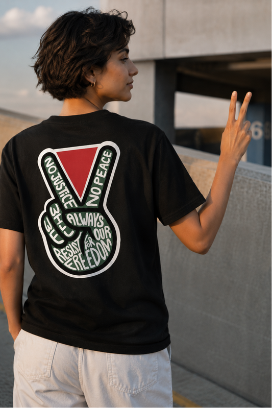 Model wearing NO PEACE UNTIL FREEDOM Palestine graphic tee from the Mo Hamz Collection
