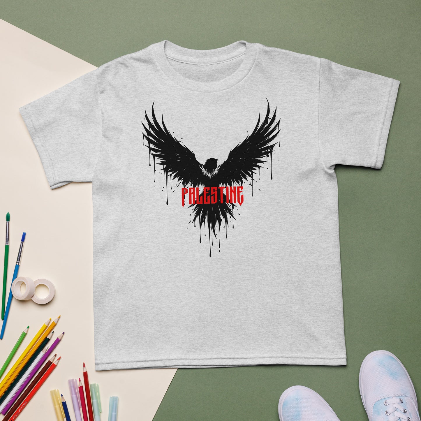 Palestine youth shirt featuring black eagle graphic with wings spread and red text design