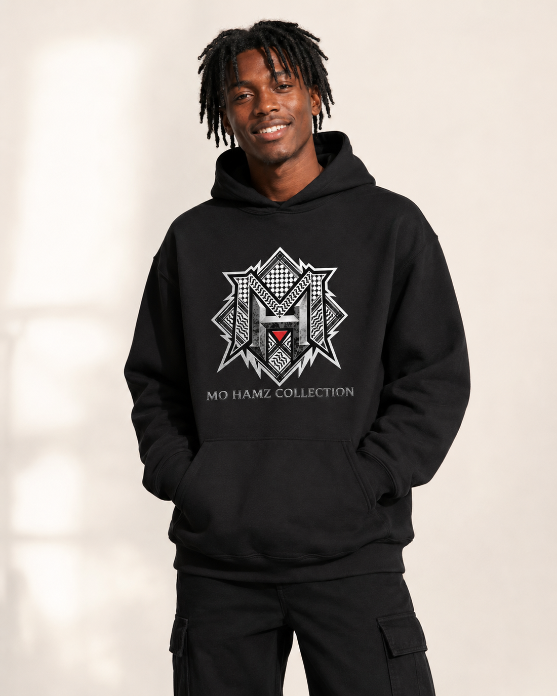 Model wearing MO HAMZ CREST Palestine hoodie from Warrior Ink Apparel