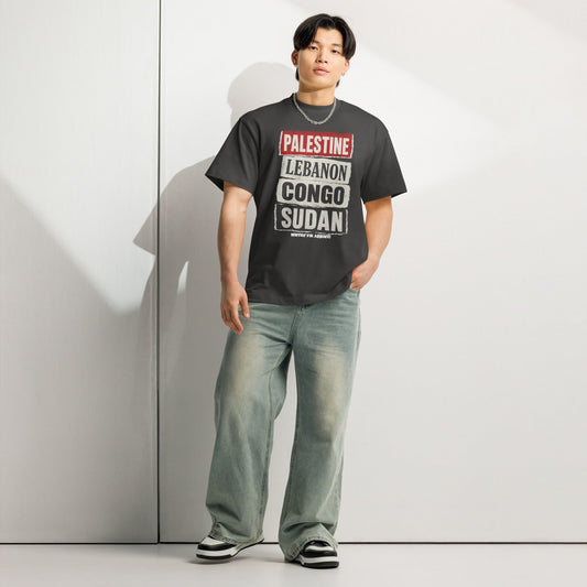 Model wearing Palestine Lebanon Congo Sudan solidarity boxy tee by Warrior Ink Apparel