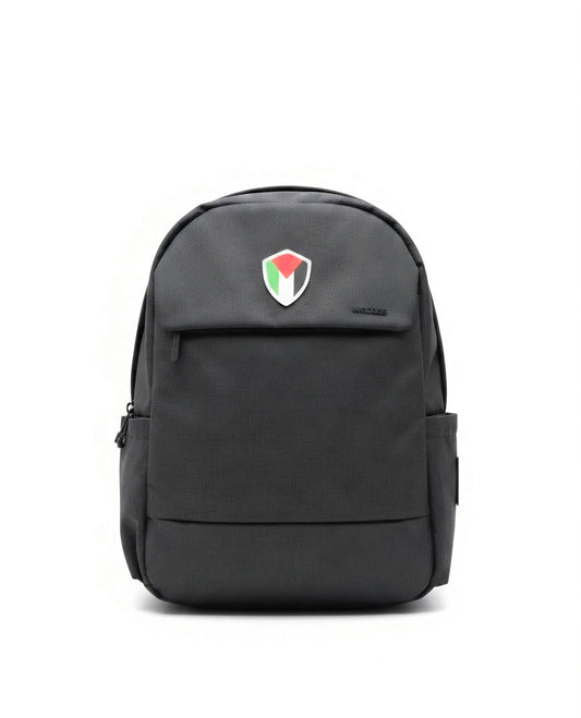 Palestine backpack 20L black laptop bag with Palestine emblem worn outdoors by Warrior Ink Apparel