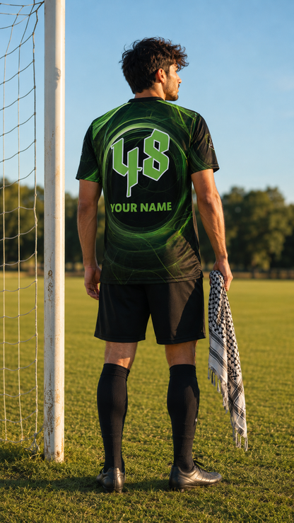 Model wearing FALASTEEN FC personalized Palestine soccer jersey by Warrior Ink Apparel on soccer field with keffiyeh