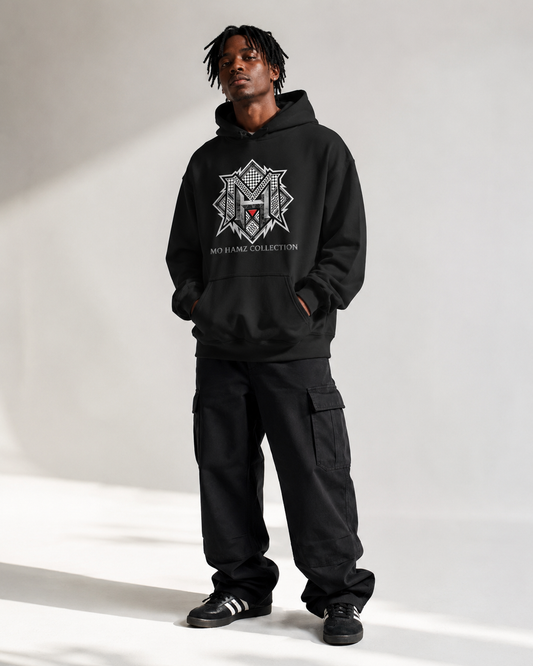 Model wearing MO HAMZ CREST Palestine hoodie from Warrior Ink Apparel
