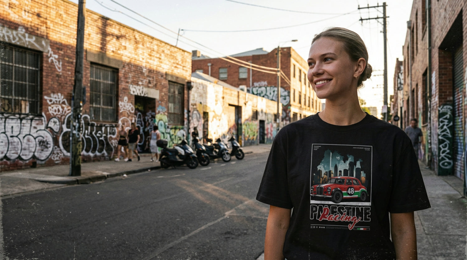 Person wearing the Palestine Racing Shirt in an urban street setting by Warrior Ink Apparel