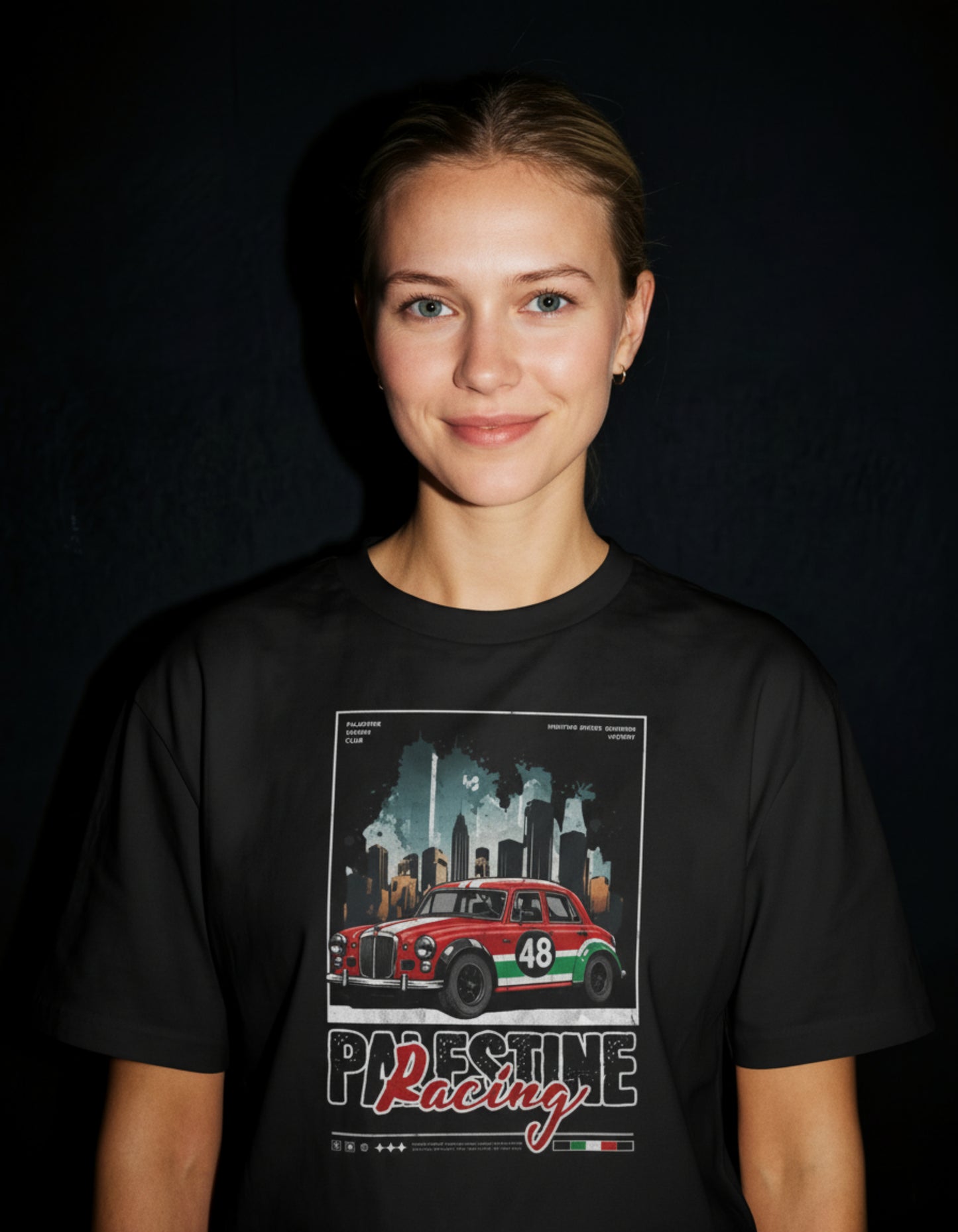 Person wearing a Palestine Racing shirt vintage motorsport graphic tee by Warrior Ink Apparel