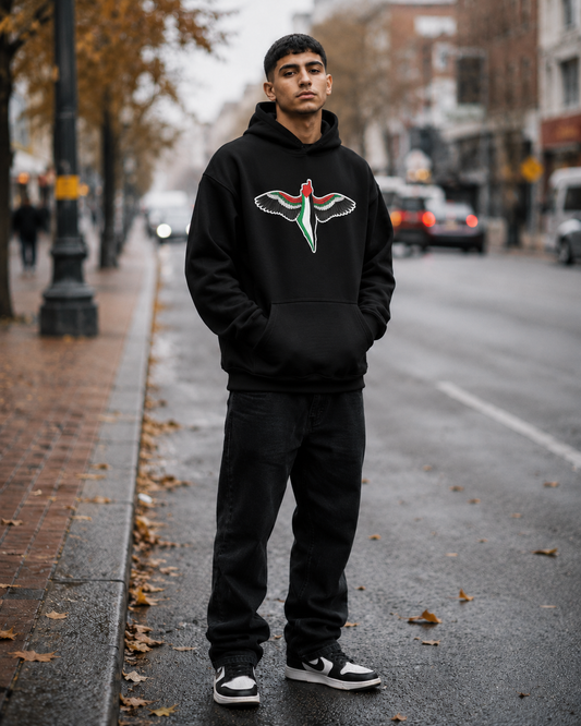Model wearing FREEDOM WINGS Palestine hoodie from Warrior Ink Apparel