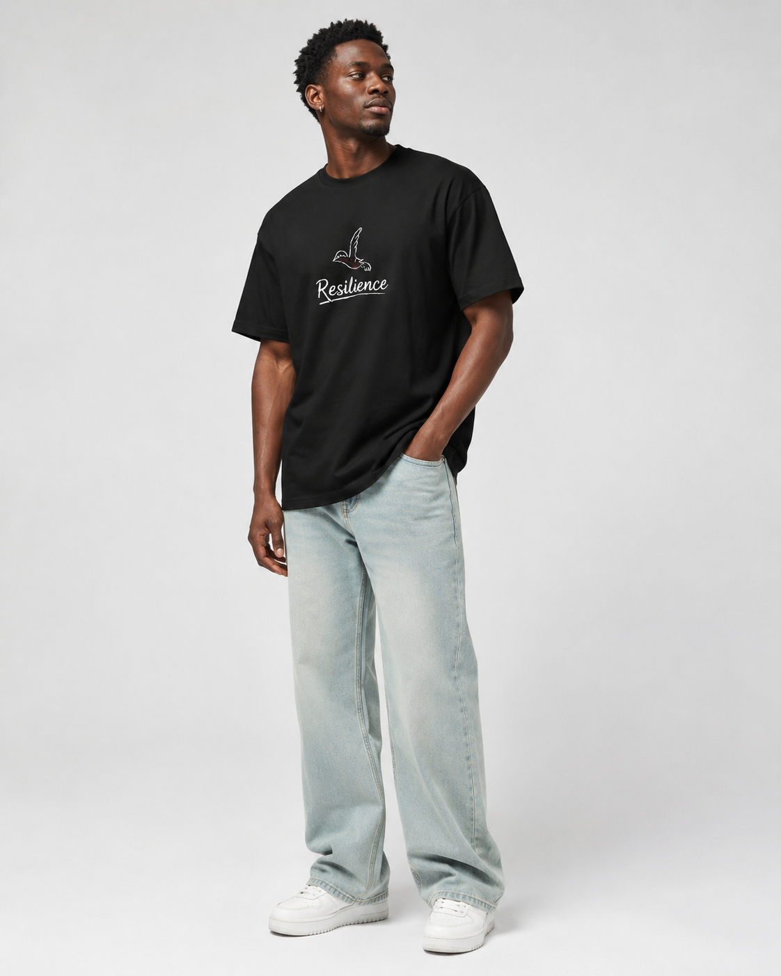 Model wearing RESILIENCE Palestine Solidarity Boxy Tee by Warrior Ink Apparel