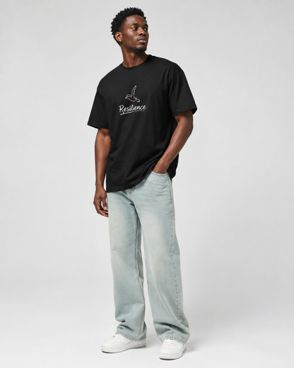 Model wearing RESILIENCE Palestine Solidarity Boxy Tee by Warrior Ink Apparel