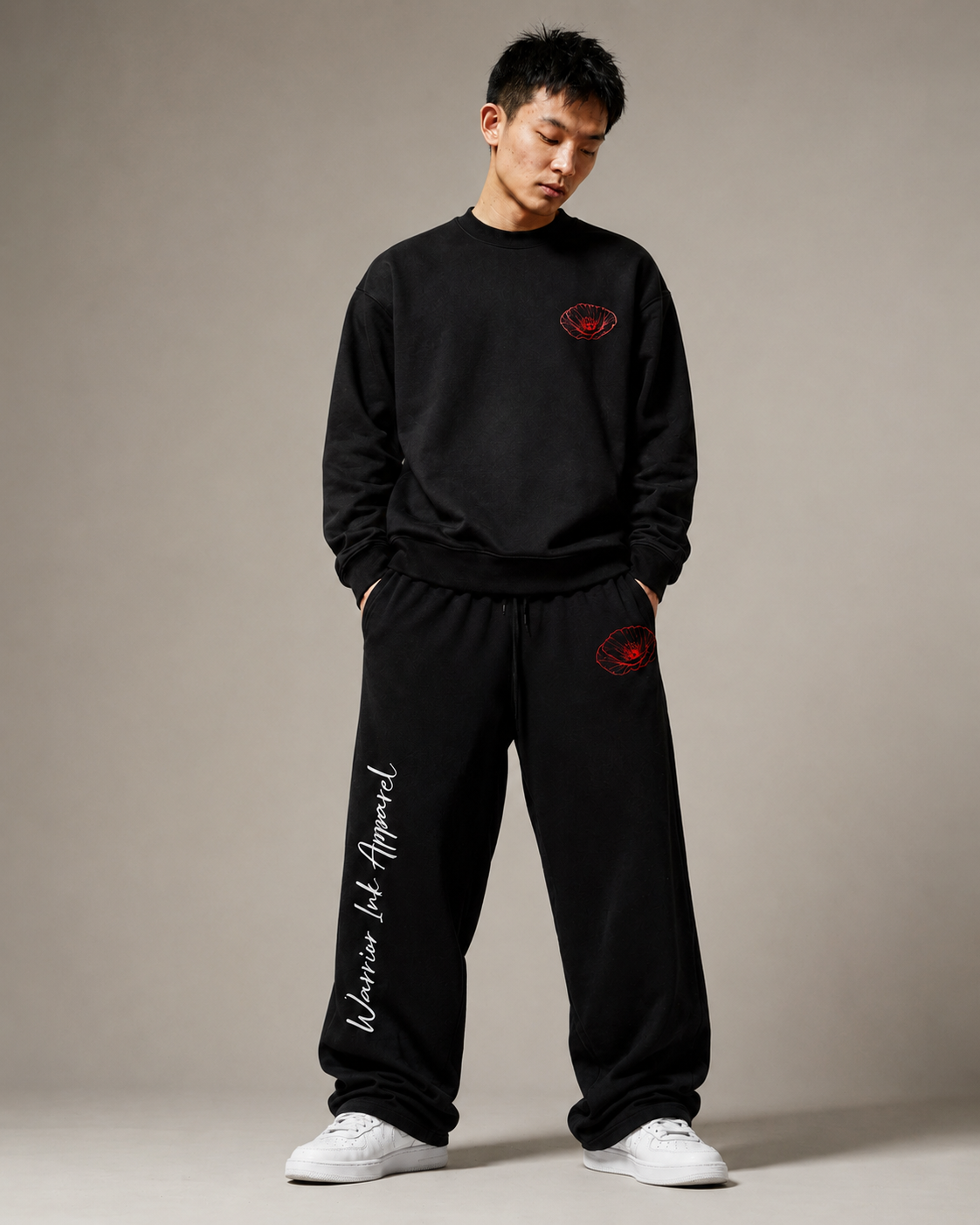 Model wearing RED POPPY OF PALESTINE wide-leg pants by Warrior Ink Apparel