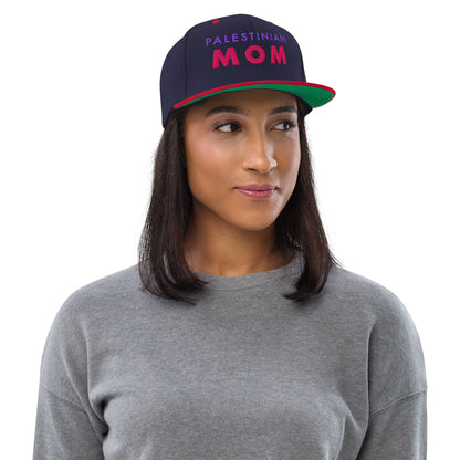 Model wearing PALESTINIAN MOM Palestine snapback cap by Warrior Ink Apparel