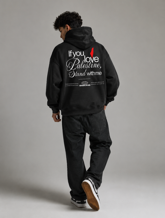 Model wearing STAND WITH PALESTINE organic hoodie by Warrior Ink Apparel