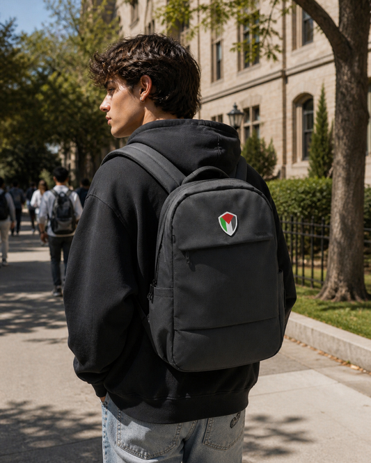Palestine backpack 20L black laptop bag with Palestine emblem worn outdoors by Warrior Ink Apparel