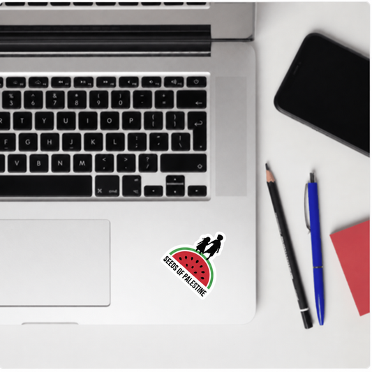 Seeds of Palestine sticker applied to silver laptop