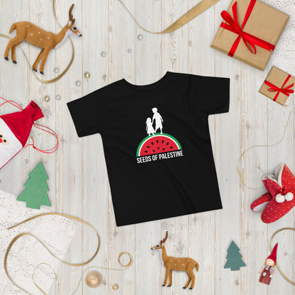 SEEDS OF PALESTINE toddler tee styled with children’s toys and Palestine graphic