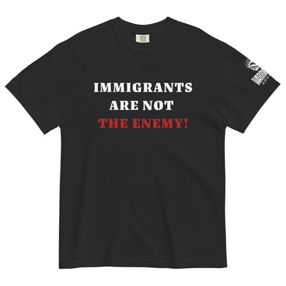 Immigrants Are Not the Enemy heavyweight solidarity tee by Warrior Ink