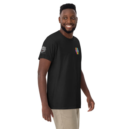 Man wearing black Let the Children Play Mo Hamz Collection tee
