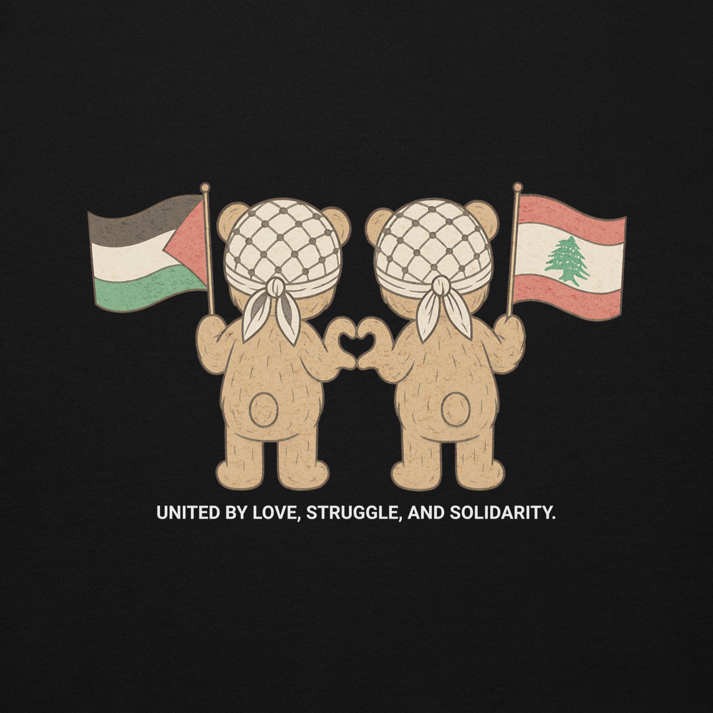 Black hoodie featuring two teddy bears wearing keffiyehs, holding Palestinian and Lebanese flags. Text below reads "United by Love, Struggle, and Solidarity."